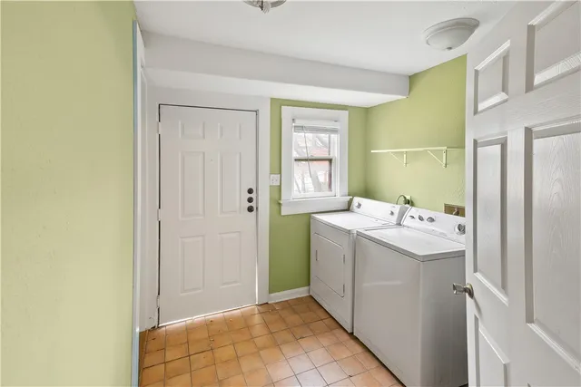 a bathroom with a sink and mirror with bathtub