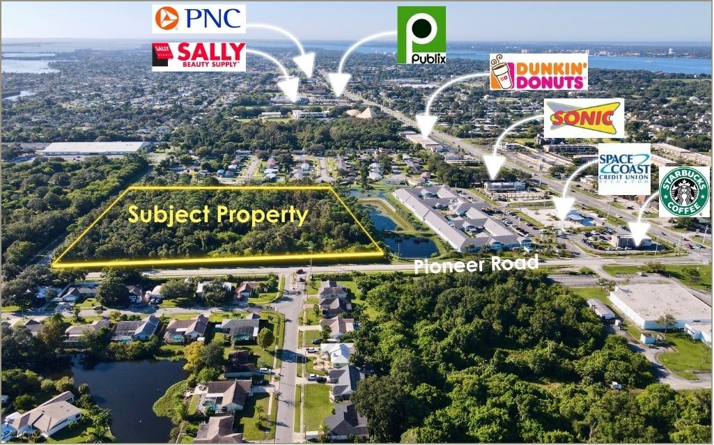 0 North Pioneer Road Merritt Island, FL 32953 - Photo 2 of 3 a sign that is on a street