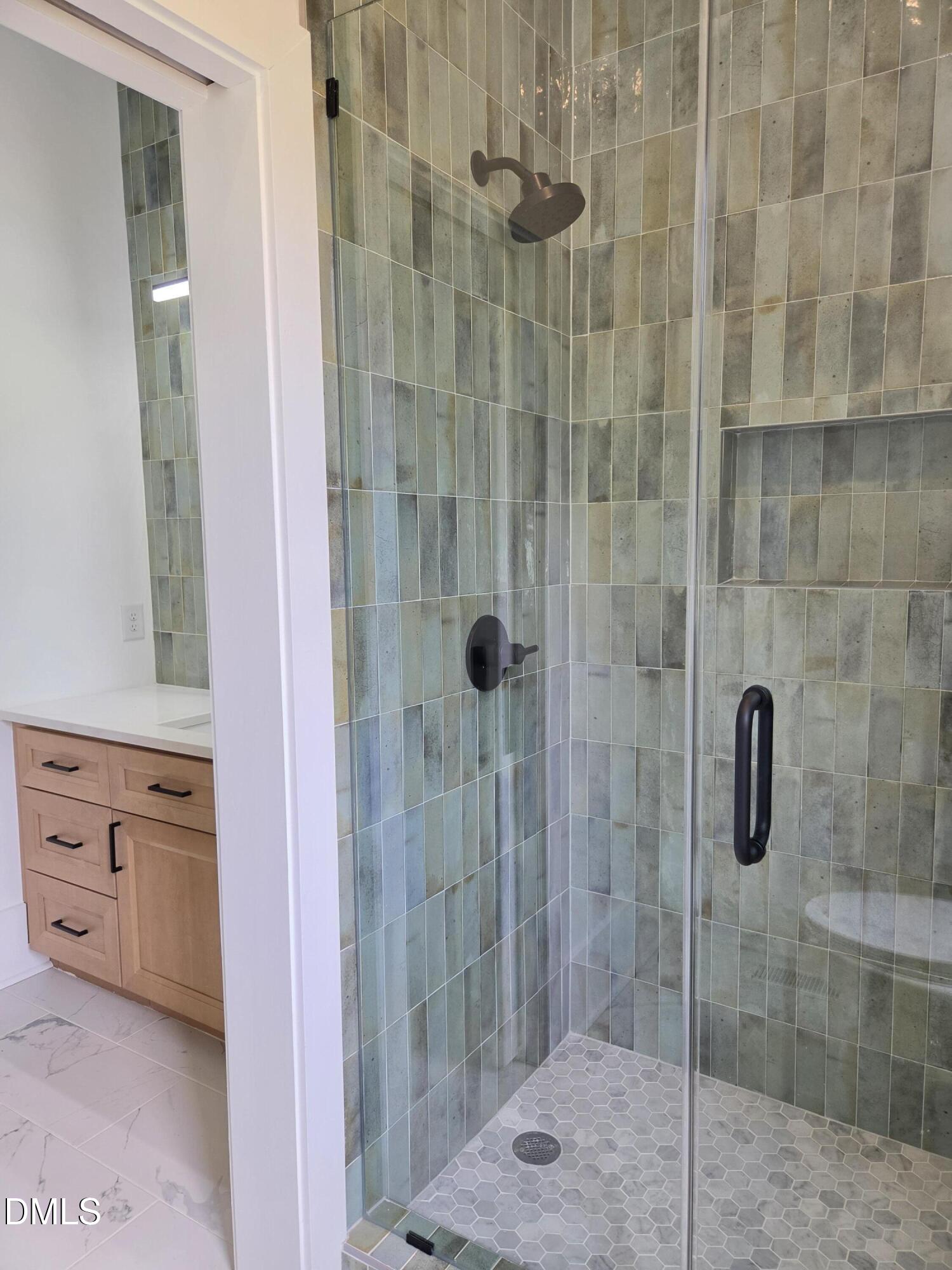 712 Van Buren Road Raleigh, NC 27604 - Photo 19 of 34 a bathroom with a shower and a sink