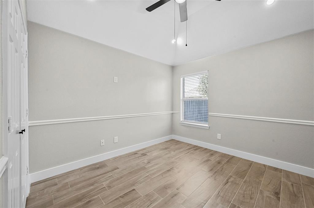 2667 Lake Ridge Drive Little Elm, TX 75068 - Photo 13 of 17 a view of an empty room with a window