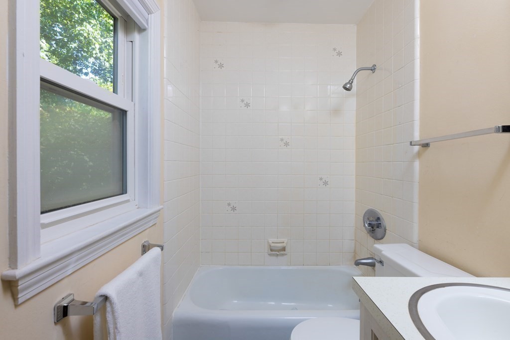 9 Belfry Terrace Lexington, MA 02421 - Photo 13 of 23 a bathroom with a toilet and a bathtub