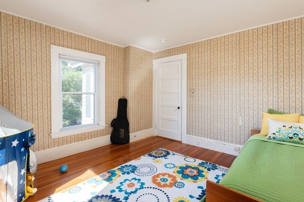 9 Belfry Terrace Lexington, MA 02421 - Photo 15 of 23 a bedroom with a bed and windows