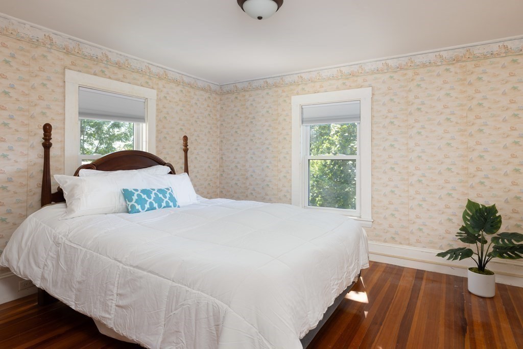 9 Belfry Terrace Lexington, MA 02421 - Photo 16 of 23 a bedroom with a bed and a window