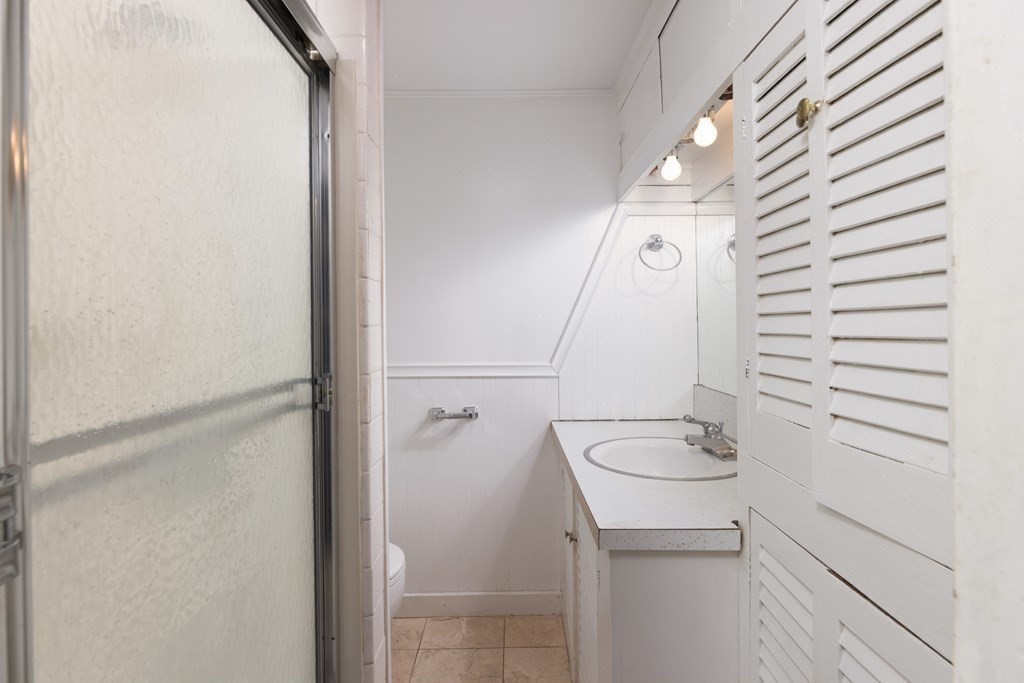 9 Belfry Terrace Lexington, MA 02421 - Photo 17 of 23 a bathroom with a sink a toilet and shower