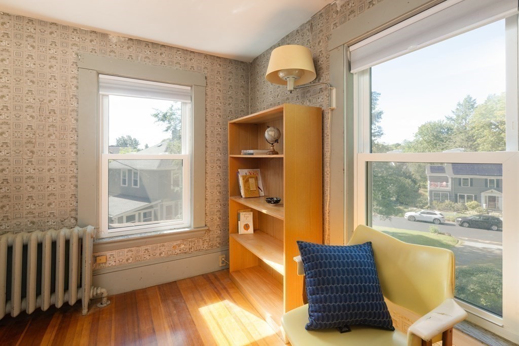 9 Belfry Terrace Lexington, MA 02421 - Photo 19 of 23 a living room with furniture and a window