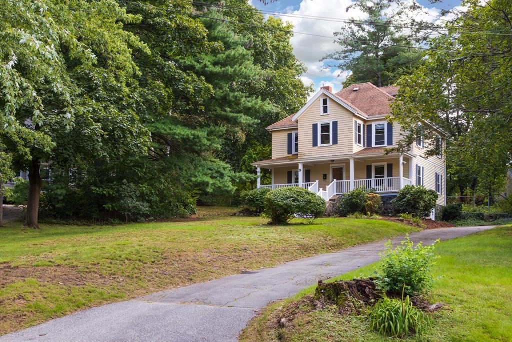9 Belfry Terrace Lexington, MA 02421 - Photo 2 of 23 a front view of a house with garden