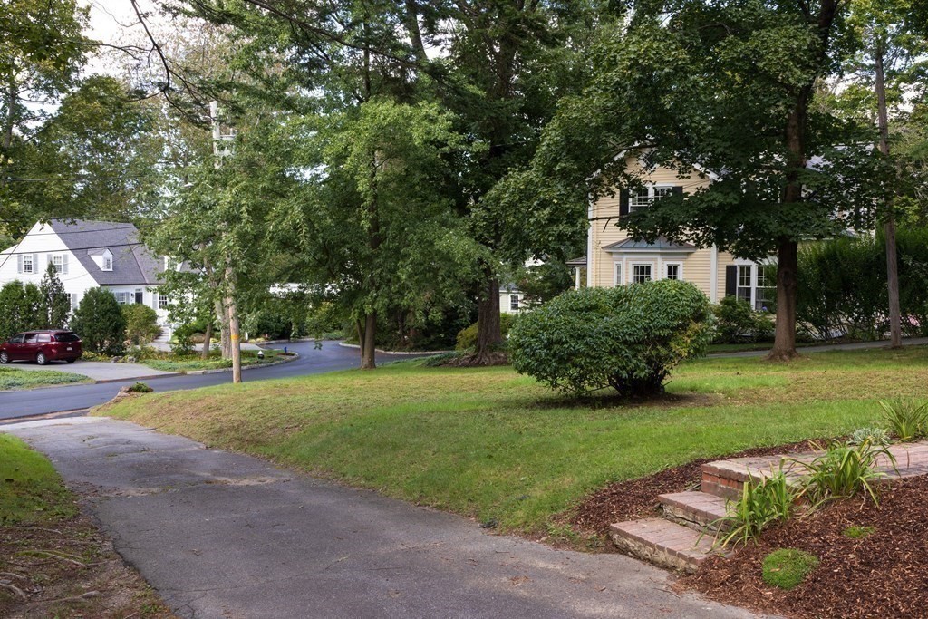 9 Belfry Terrace Lexington, MA 02421 - Photo 5 of 23 a front view of a house with garden
