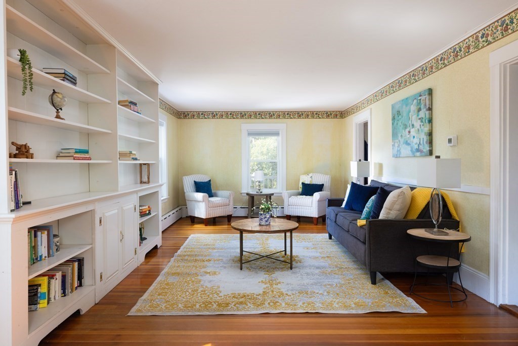 9 Belfry Terrace Lexington, MA 02421 - Photo 7 of 23 a living room with furniture and a rug