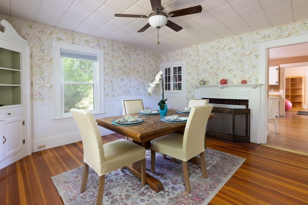 9 Belfry Terrace Lexington, MA 02421 - Photo 9 of 23 a view of a dining room with furniture wooden floor and chandelier