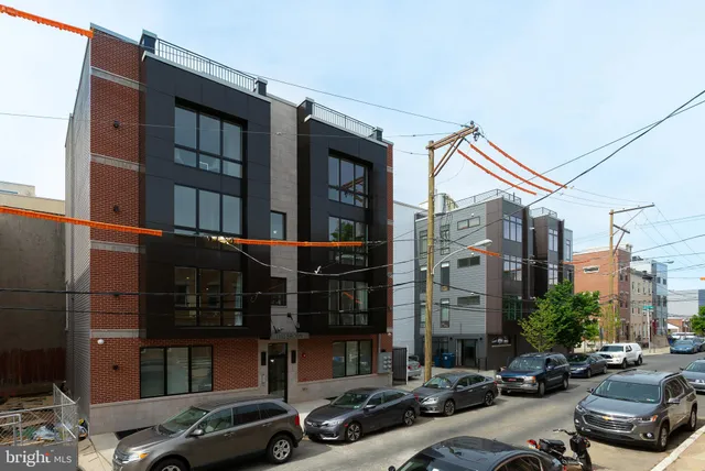a car parked in front of a building