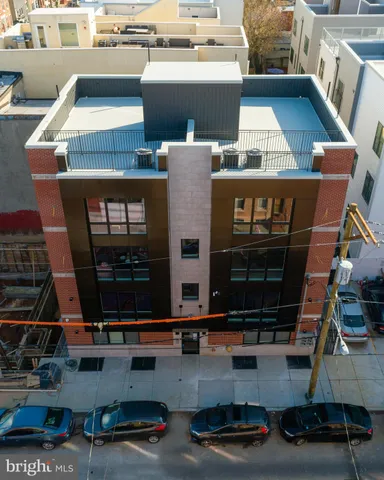 a view of a swimming pool with outdoor seating
