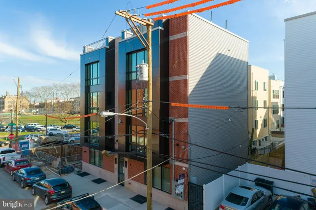 a bathroom with a glass door shower