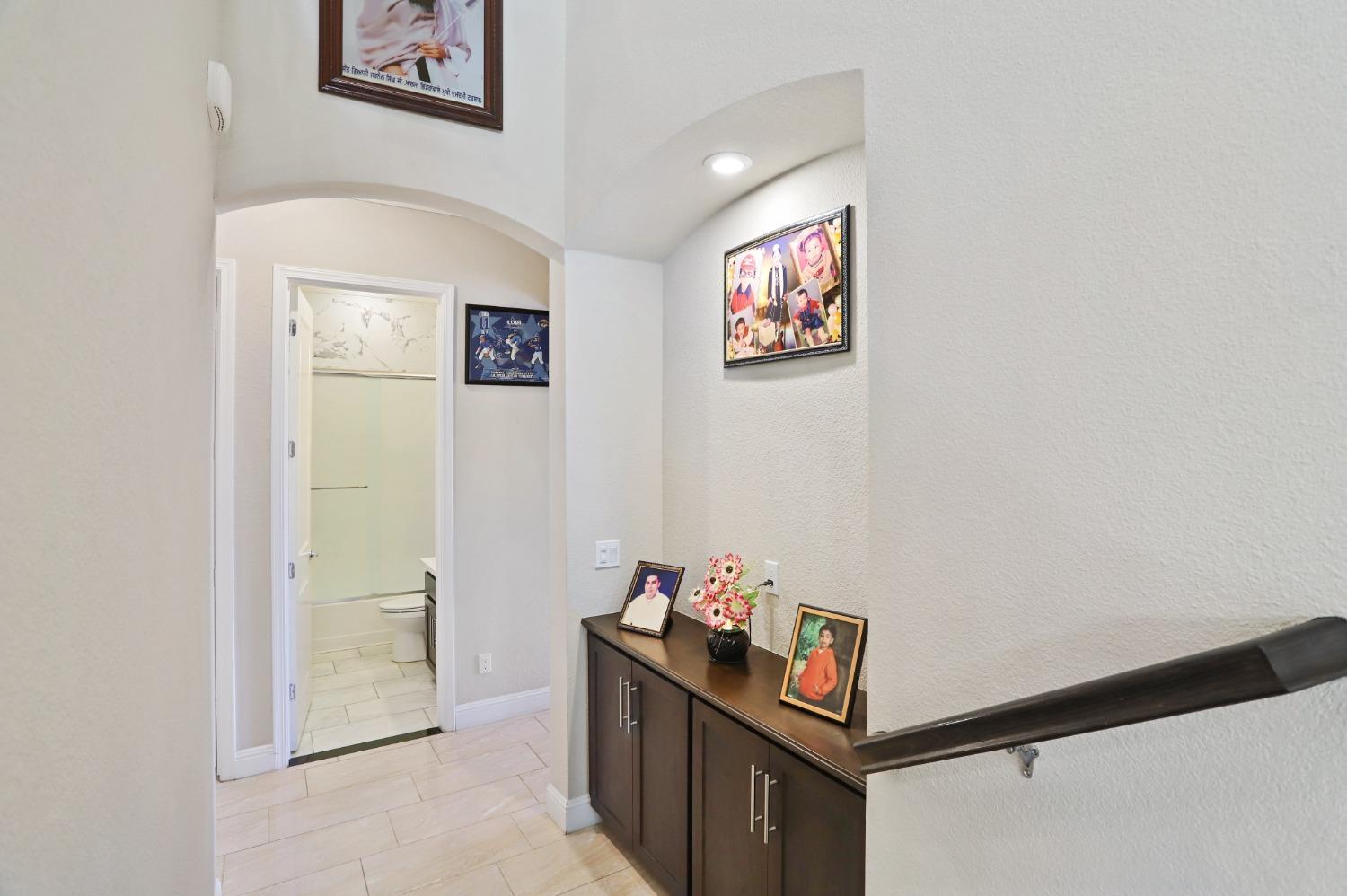 2925 Fuchsia Drive Lodi, CA 95242 - Photo 12 of 44 a view of a hallway with workspace