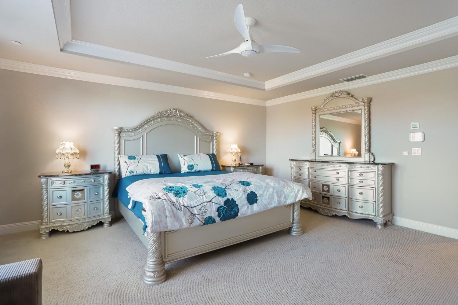 2925 Fuchsia Drive Lodi, CA 95242 - Photo 28 of 44 a bedroom with a bed and a dresser