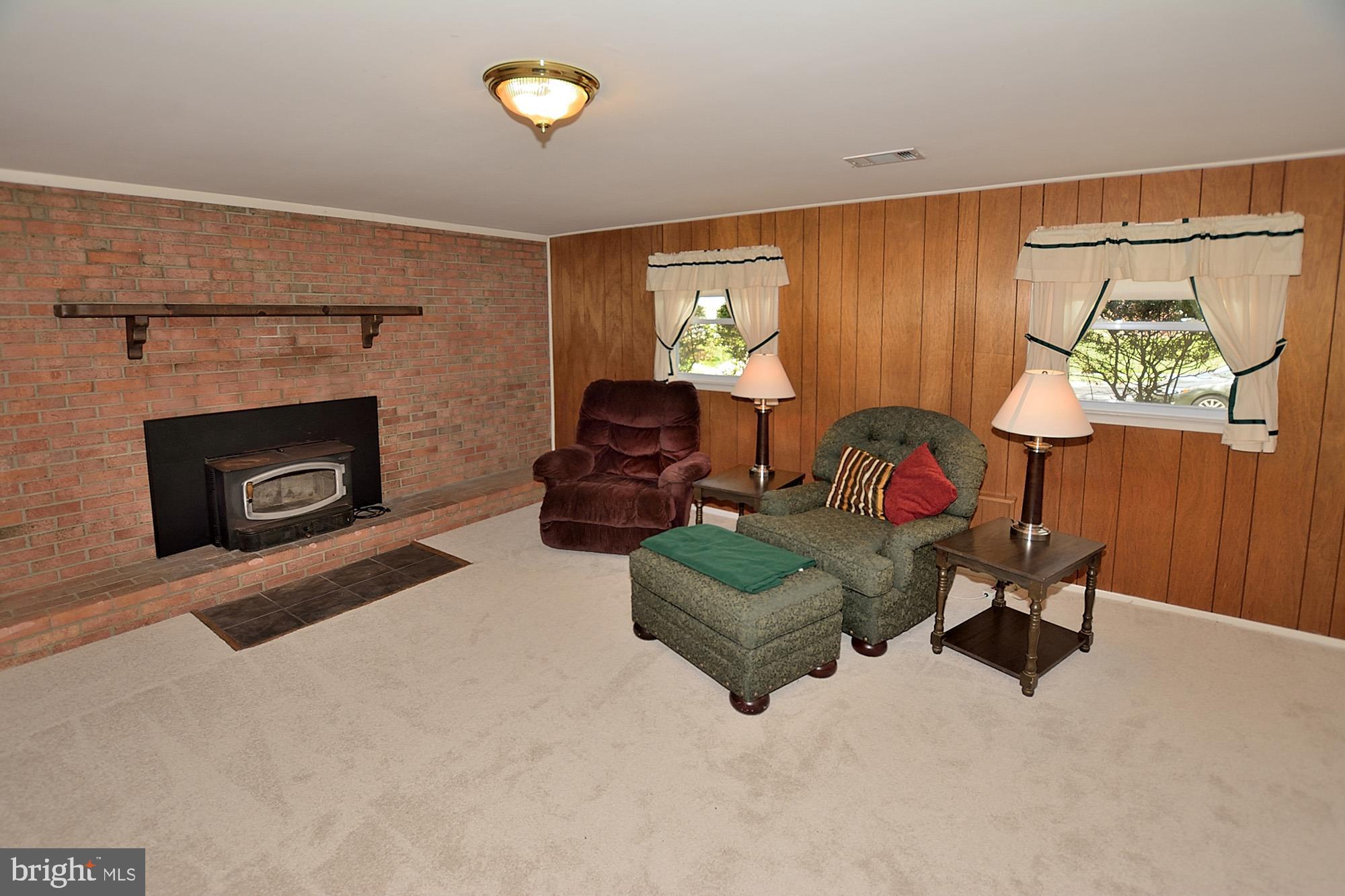 8303 Brixton Street Springfield, VA 22152 - Photo 21 of 29 Cozy Lower Level Family RM , Wood Fireplace Insert