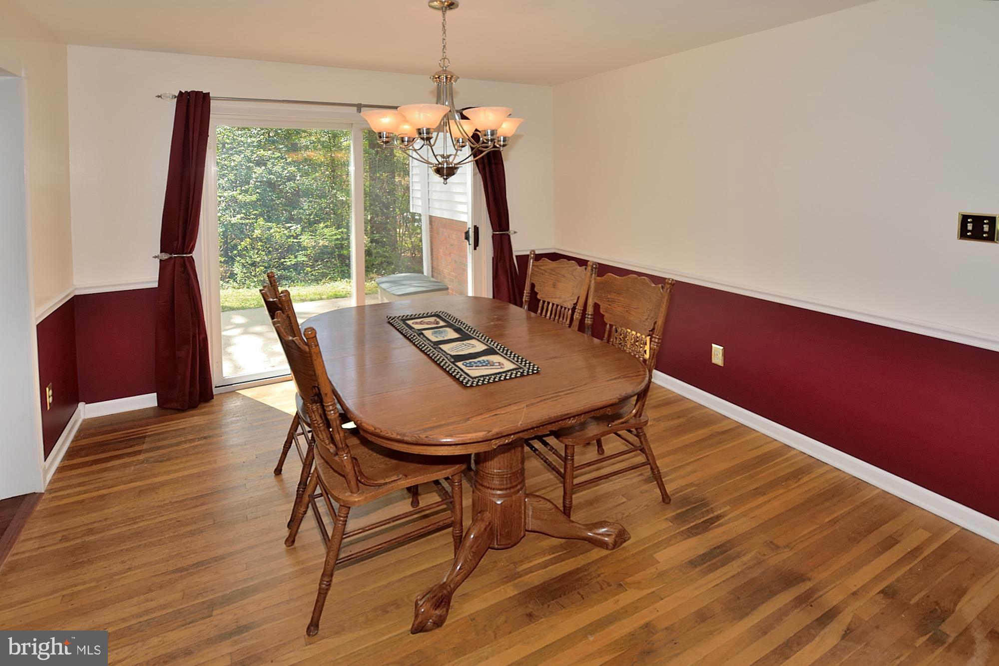 8303 Brixton Street Springfield, VA 22152 - Photo 6 of 29 Spacious Living Room /Dining Room area - Patio