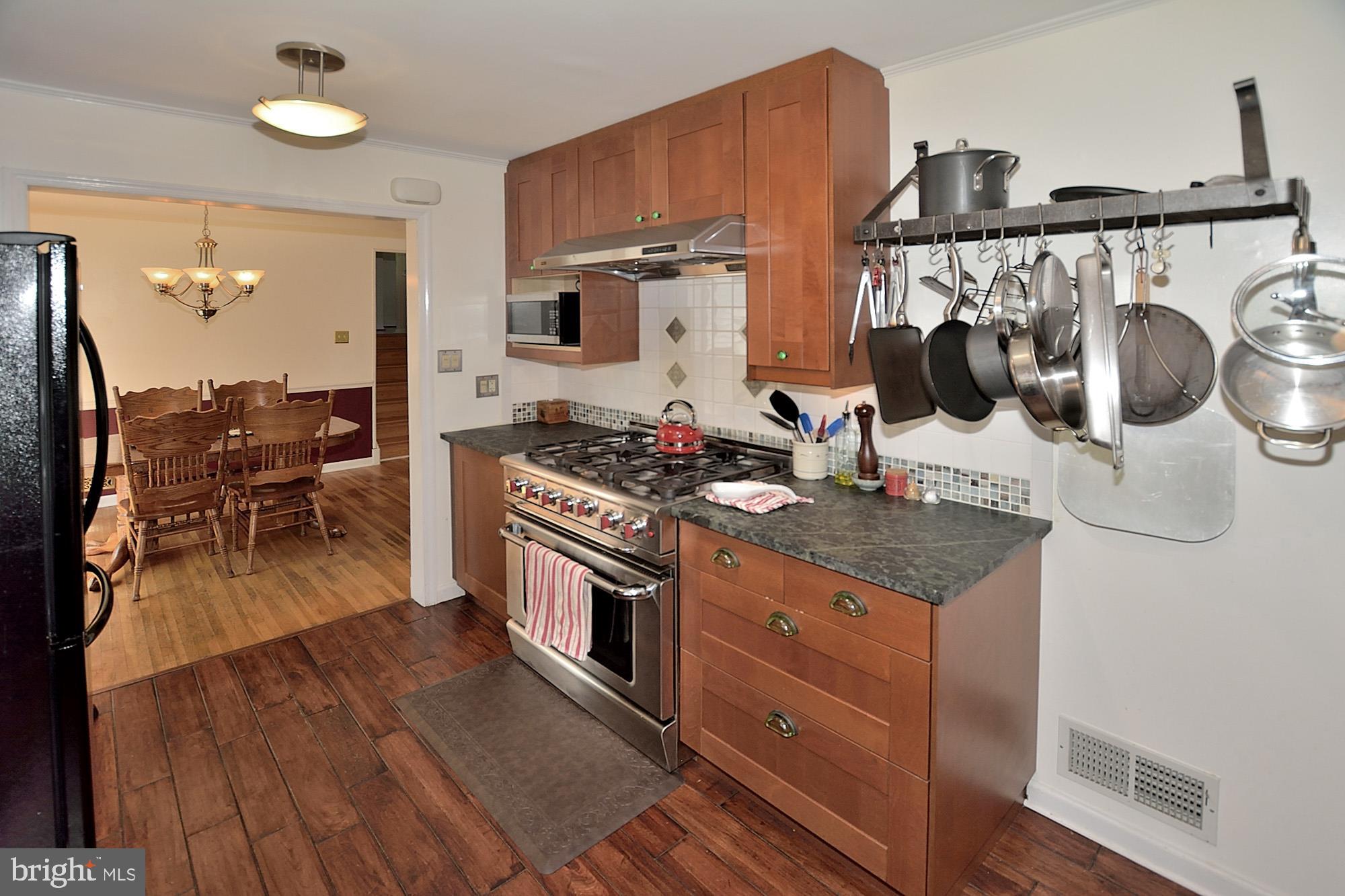8303 Brixton Street Springfield, VA 22152 - Photo 10 of 29 Chef's Kitchen, Soapstone Counters, GREAT Range