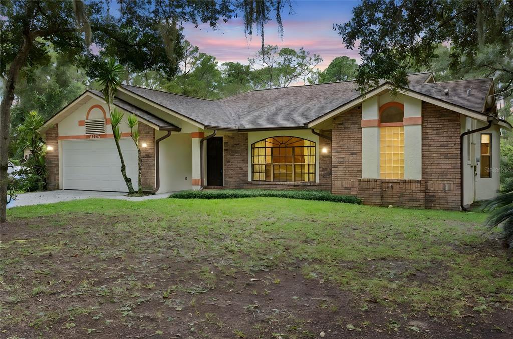 4164 New Marsh Road DeLand, FL 32724 - Photo 1 of 1 a house view with a garden space