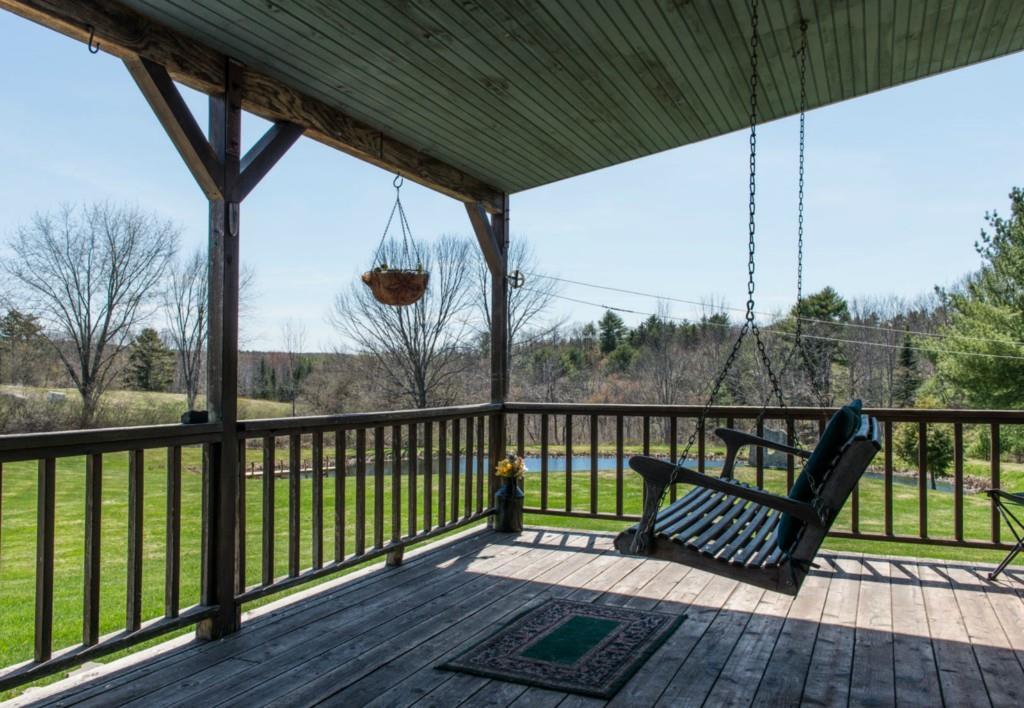128 River Road Edgecomb, ME 04556 - Photo 6 of 22 Large front porch.