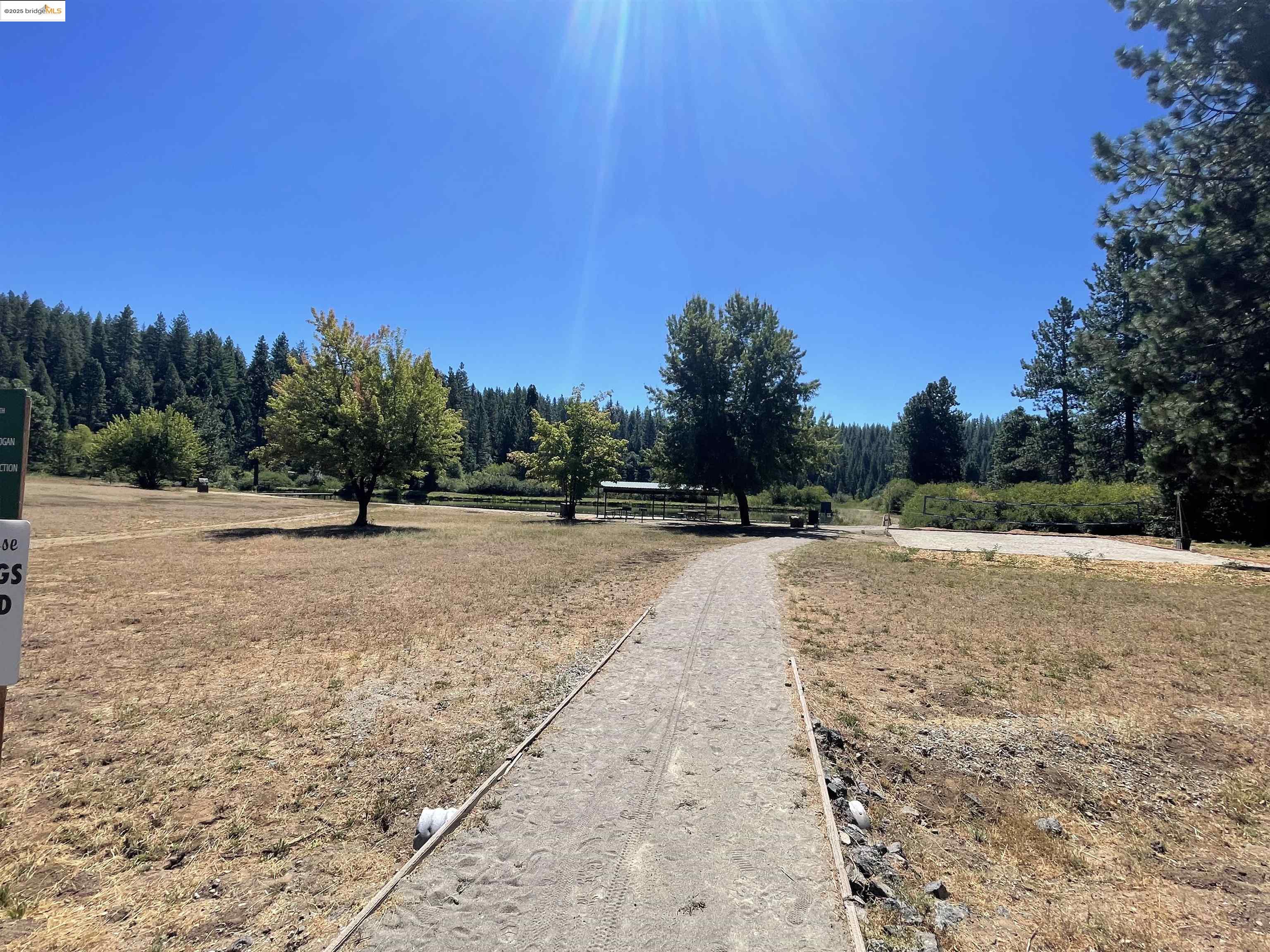 25476 Rebekah Road Long Barn, CA 95335 - Photo 6 of 11 a view of outdoor space with trees