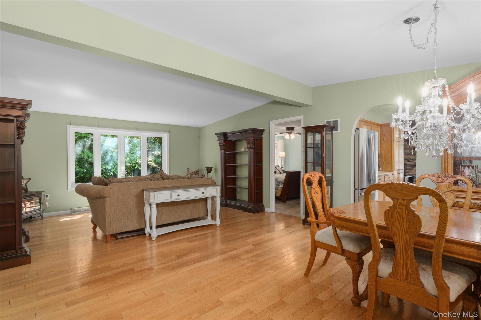 590 Farm To Market Road Brewster, NY 10509 - Photo 12 of 32 a living room with furniture and a dining table with wooden floor