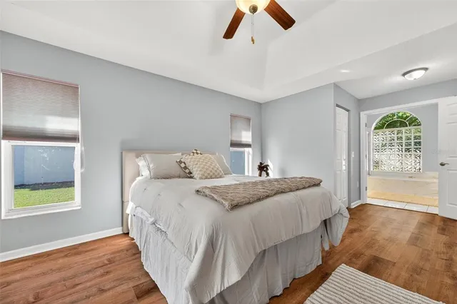 a spacious bathroom with a bathtub and a shower