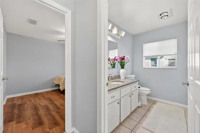 a view of swimming pool with outdoor seating and yard in back