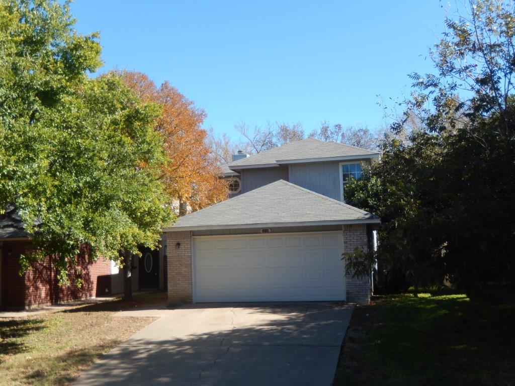 2229 Jasmine Path Round Rock, TX 78664 - Photo 1 of 1 a front view of a house with a yard and garage