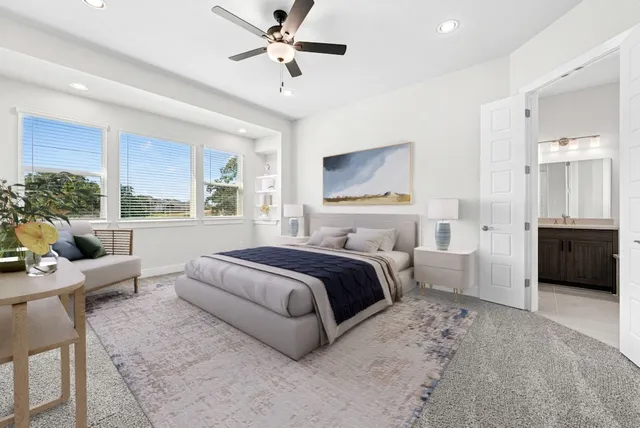 a room with gym equipment and wooden floor