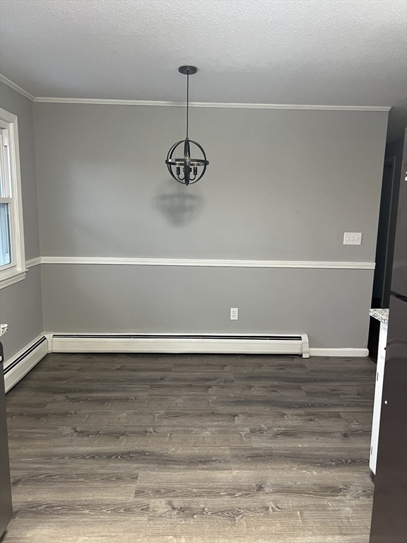 72 Clement Street Springfield, MA 01118 - Photo 16 of 36 a view of a room with wooden floor and window