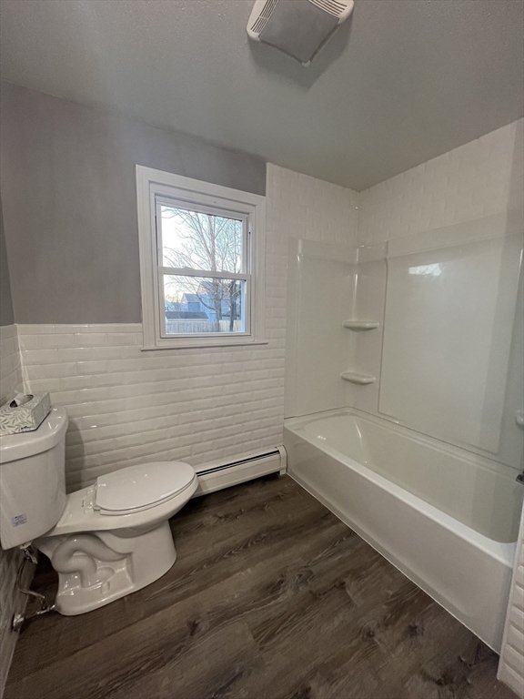72 Clement Street Springfield, MA 01118 - Photo 22 of 36 a bathroom with a toilet a sink and bathtub