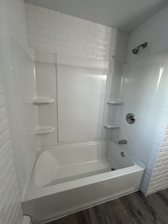 72 Clement Street Springfield, MA 01118 - Photo 23 of 36 a bathroom with a bathtub
