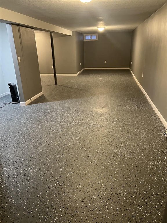 72 Clement Street Springfield, MA 01118 - Photo 31 of 36 a view of a room with wooden floor and entrance