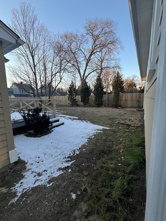 72 Clement Street Springfield, MA 01118 - Photo 8 of 36 a view of a yard with cars