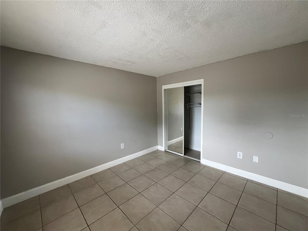 4142 Flying Fortress Avenue Kissimmee, FL 34741 - Photo 7 of 12 a view of an empty room and window