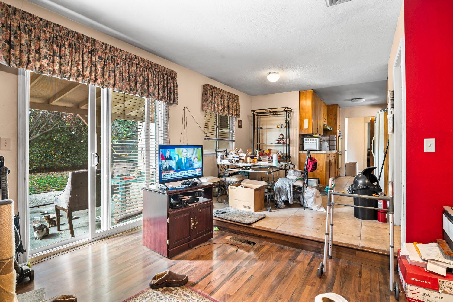 3141 Lisa Drive Modesto, CA 95350 - Photo 12 of 29 a living room with furniture a flat screen tv and floor to ceiling window