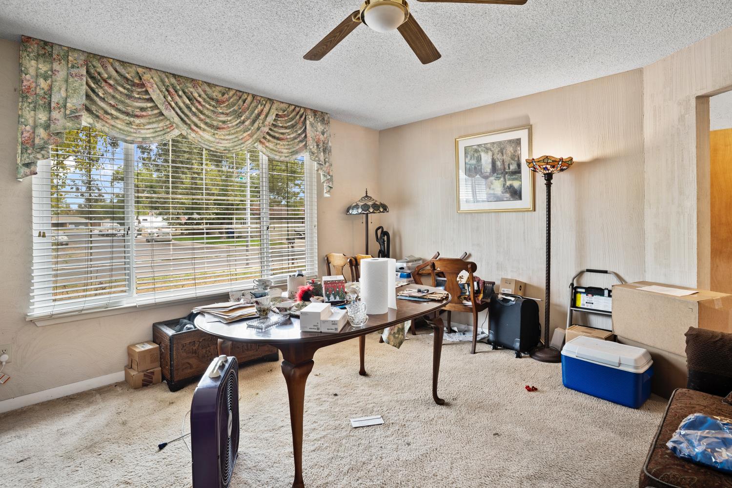 3141 Lisa Drive Modesto, CA 95350 - Photo 7 of 29 a living room with furniture and a large window