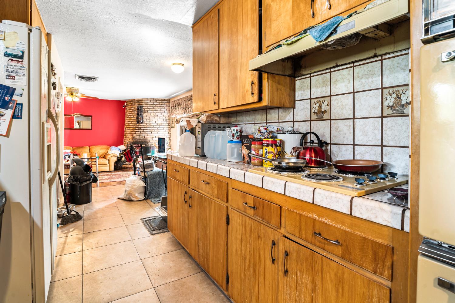 3141 Lisa Drive Modesto, CA 95350 - Photo 9 of 29 a kitchen with stainless steel appliances granite countertop a sink and cabinets
