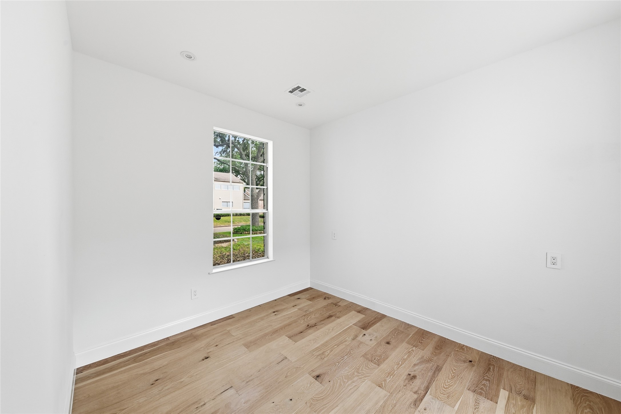 15827 Foxgate Road Houston, TX 77079 - Photo 12 of 37 Private first floor office with a large window overlooking the front yard. A clean minimal design makes this place ideal for working from home or quiet study