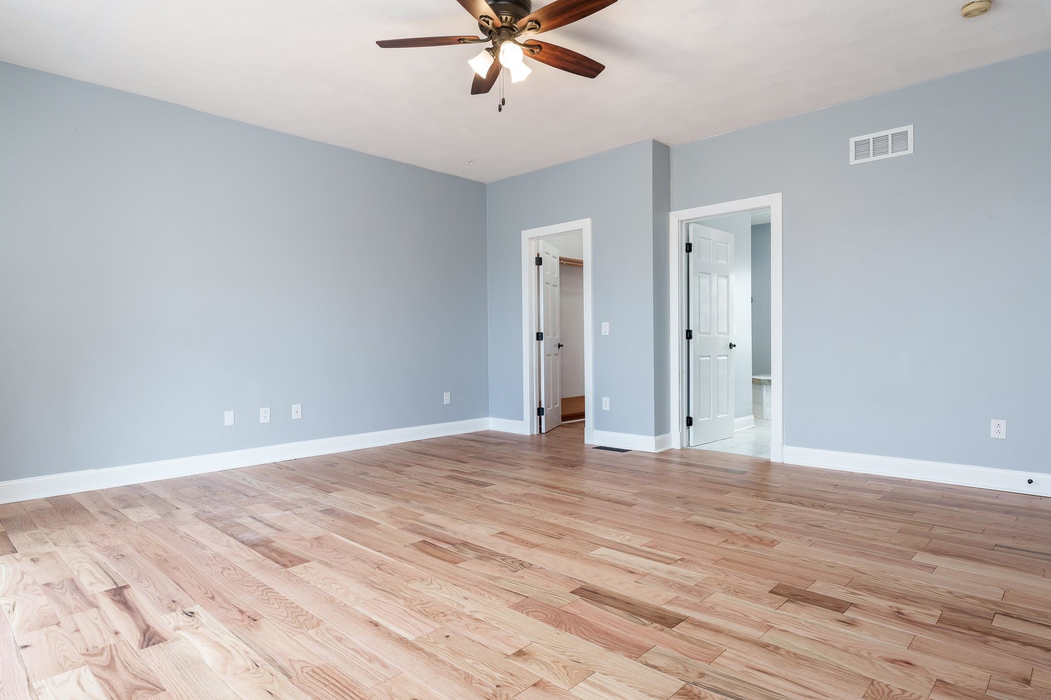 14949 Saunders Road Pecatonica, IL 61063 - Photo 18 of 88 a view of an empty room with wooden floor