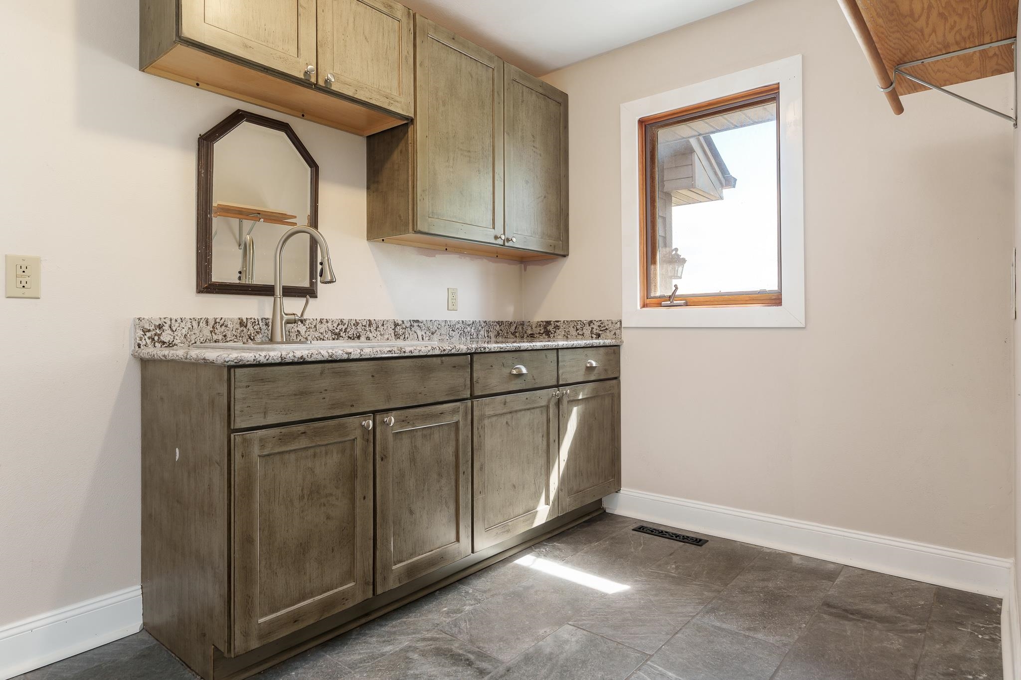 14949 Saunders Road Pecatonica, IL 61063 - Photo 28 of 88 a kitchen with a sink cabinets and a window