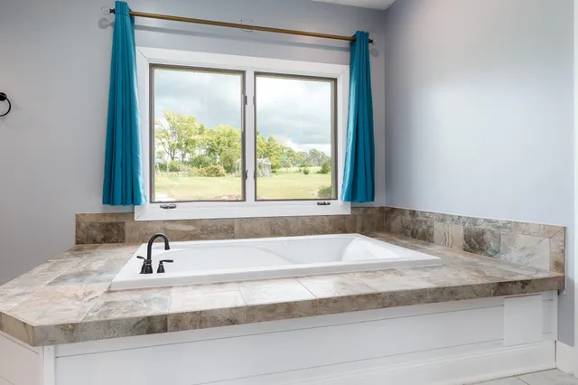 a bathroom with a bathtub