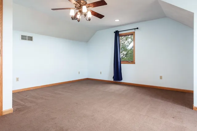 an aerial view of a residential houses with outdoor space and swimming pool
