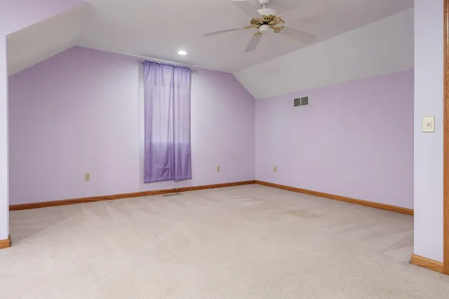 a view of a swimming pool and an outdoor seating