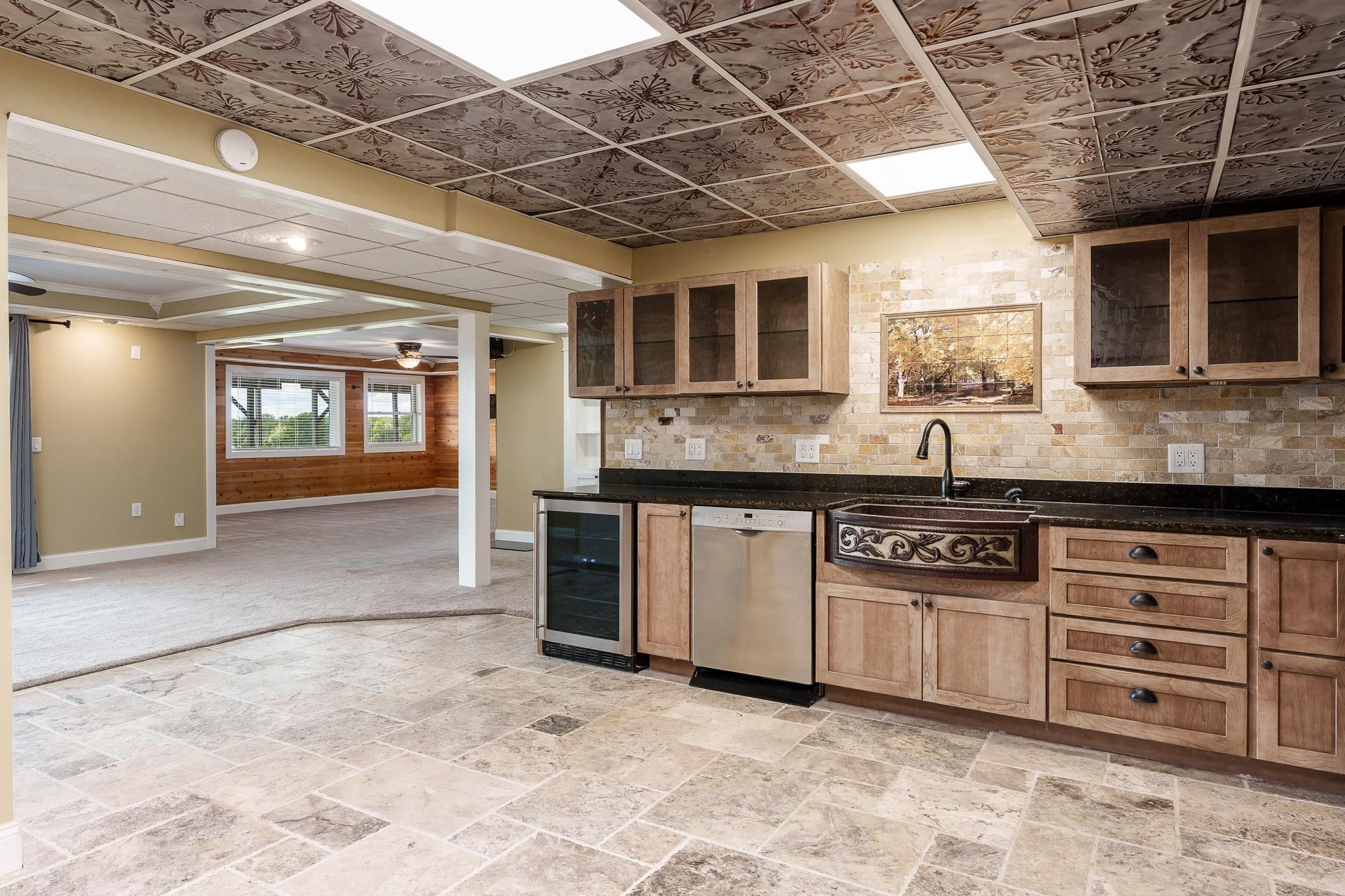 14949 Saunders Road Pecatonica, IL 61063 - Photo 53 of 88 a kitchen with stainless steel appliances granite countertop a stove a sink and a microwave