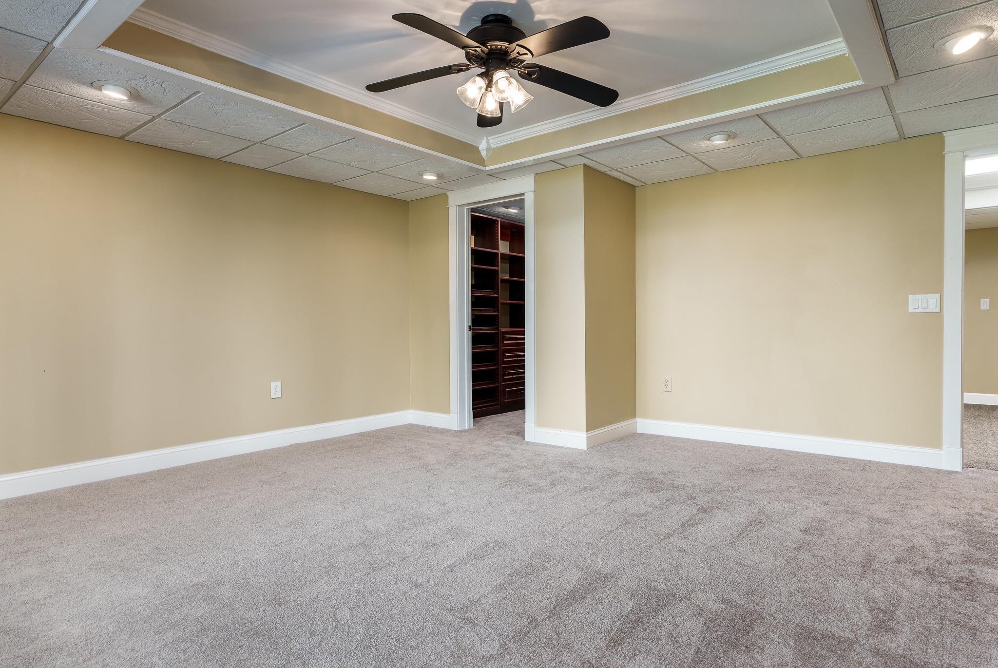 14949 Saunders Road Pecatonica, IL 61063 - Photo 58 of 88 a view of an empty room with a ceiling fan