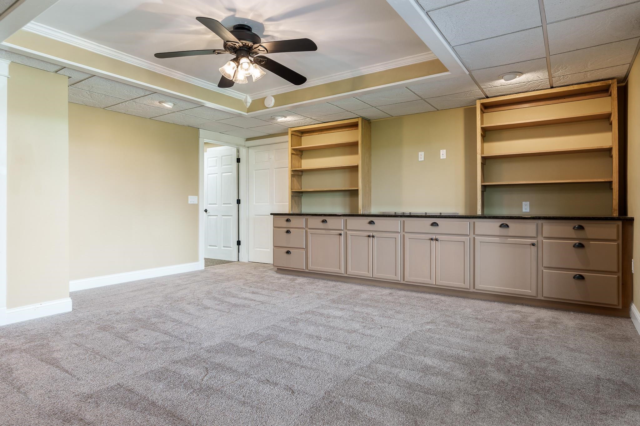 14949 Saunders Road Pecatonica, IL 61063 - Photo 59 of 88 a view of a kitchen with a sink and cabinets