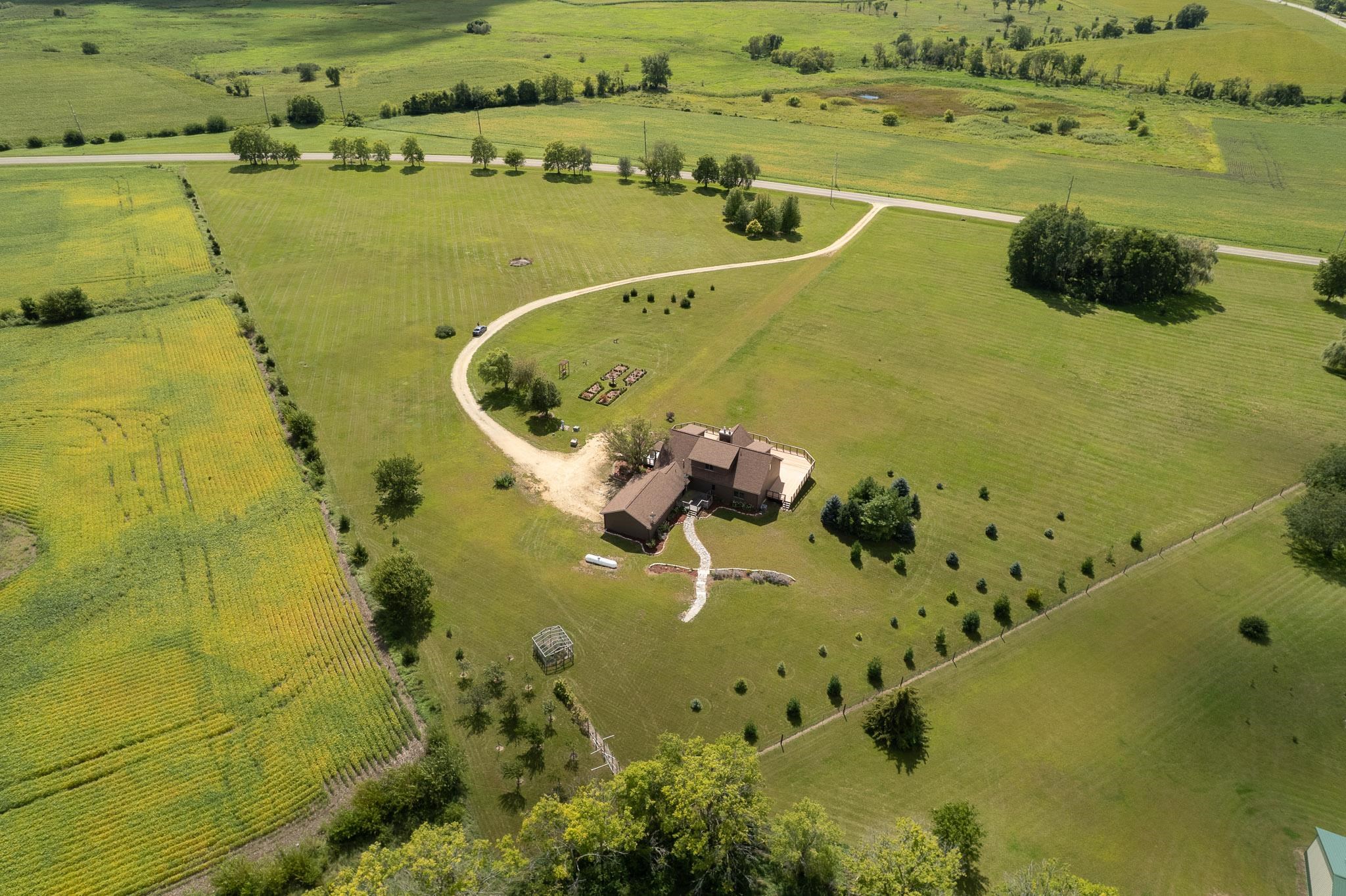 14949 Saunders Road Pecatonica, IL 61063 - Photo 68 of 88 an aerial view of a residential houses with outdoor space