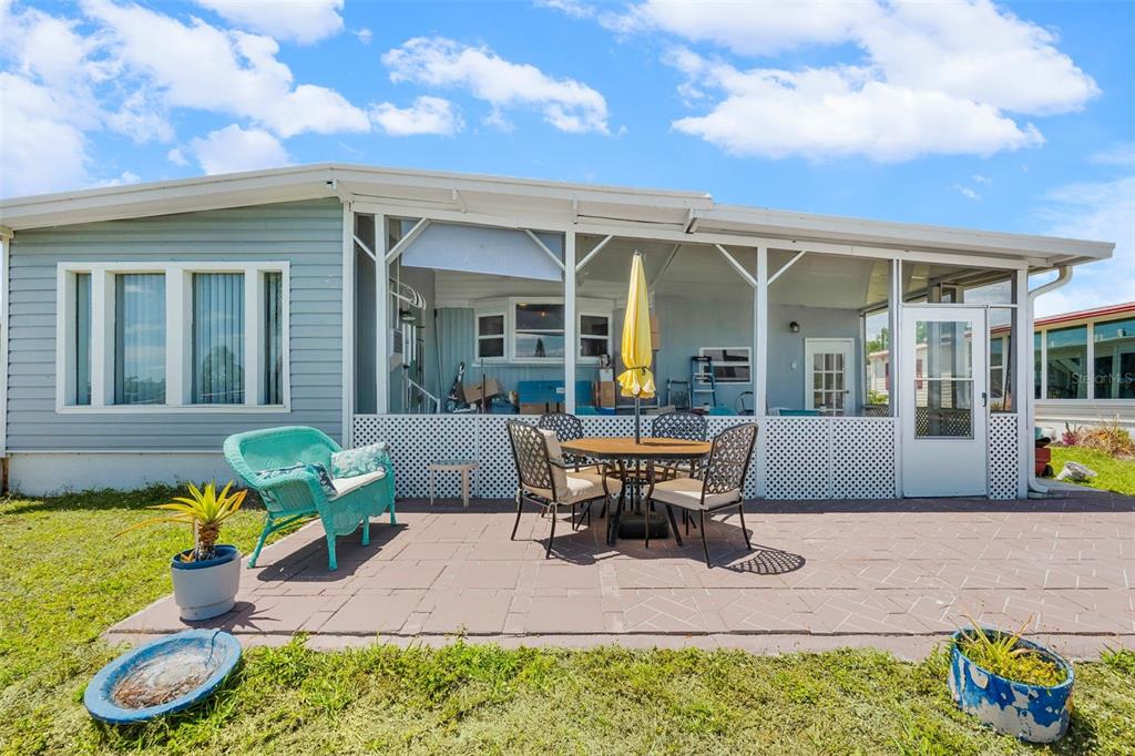 970 Jolanda Circle Venice, FL 34285 - Photo 23 of 34 a view of a house with backyard sitting area and porch