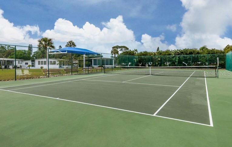 970 Jolanda Circle Venice, FL 34285 - Photo 30 of 34 a view of an outdoor space and tennis court